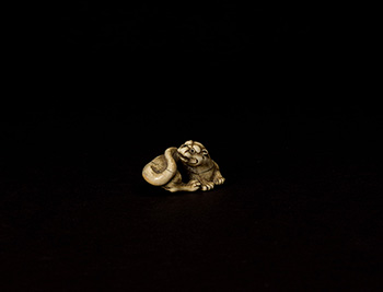 A Japanese Ivory Carved Netsuke of a Tiger, Kyoto School, 17th/18th Century by  Japanese Art