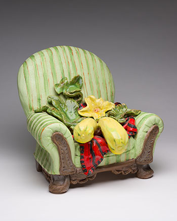 Green Chair with Vegetables by Victor Cicansky sold for $3,438