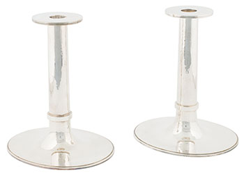 Two Candlesticks by  Unknown Artist sold for $1,000