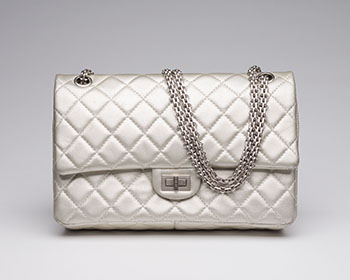 A MEDIUM SILVER QUILTED LAMBSKIN LEATHER 2.55 REISSUE DOUBLE FLAP SHOULDER BAG WITH SILVER HARDWARE by  CHANEL sold for $4,063