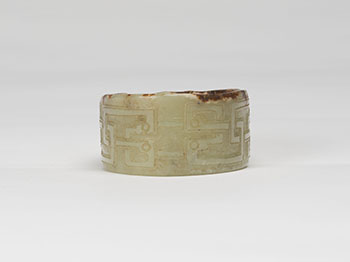 A Chinese Celadon and Russet Tubular Jade Ornament, Possibly Neolithic with Later Carving by  Chinese Art