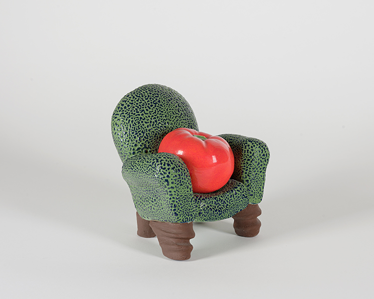 Tomato in Armchair by Victor Cicansky
