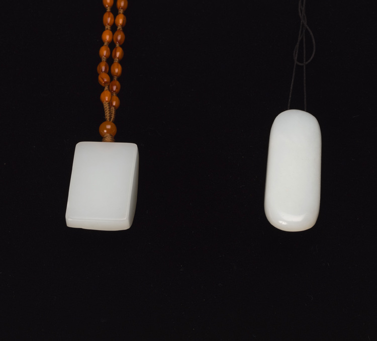 Two Chinese White Jade Carved Pebbles by  Chinese Art
