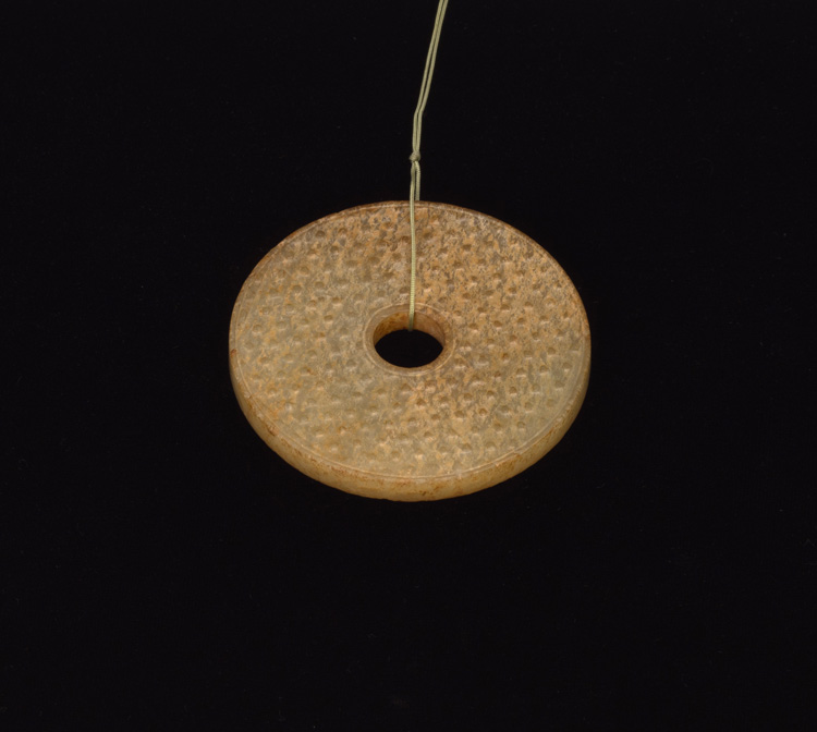 A Chinese Mottled Celadon Jade Disc, Bi, Probably Eastern Han Dynasty par  Chinese Art