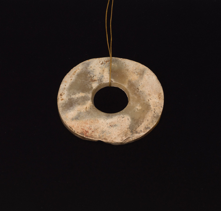 A Chinese Mottled Jade Disc, Bi, Neolithic Period par  Chinese Art