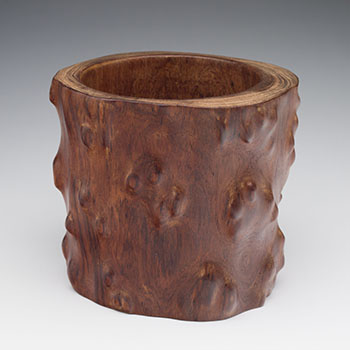 A Chinese Huanghuali ‘Tree Trunk Form’ Brushpot, Bitong, 19th Century by  Chinese Art sold for $8,125